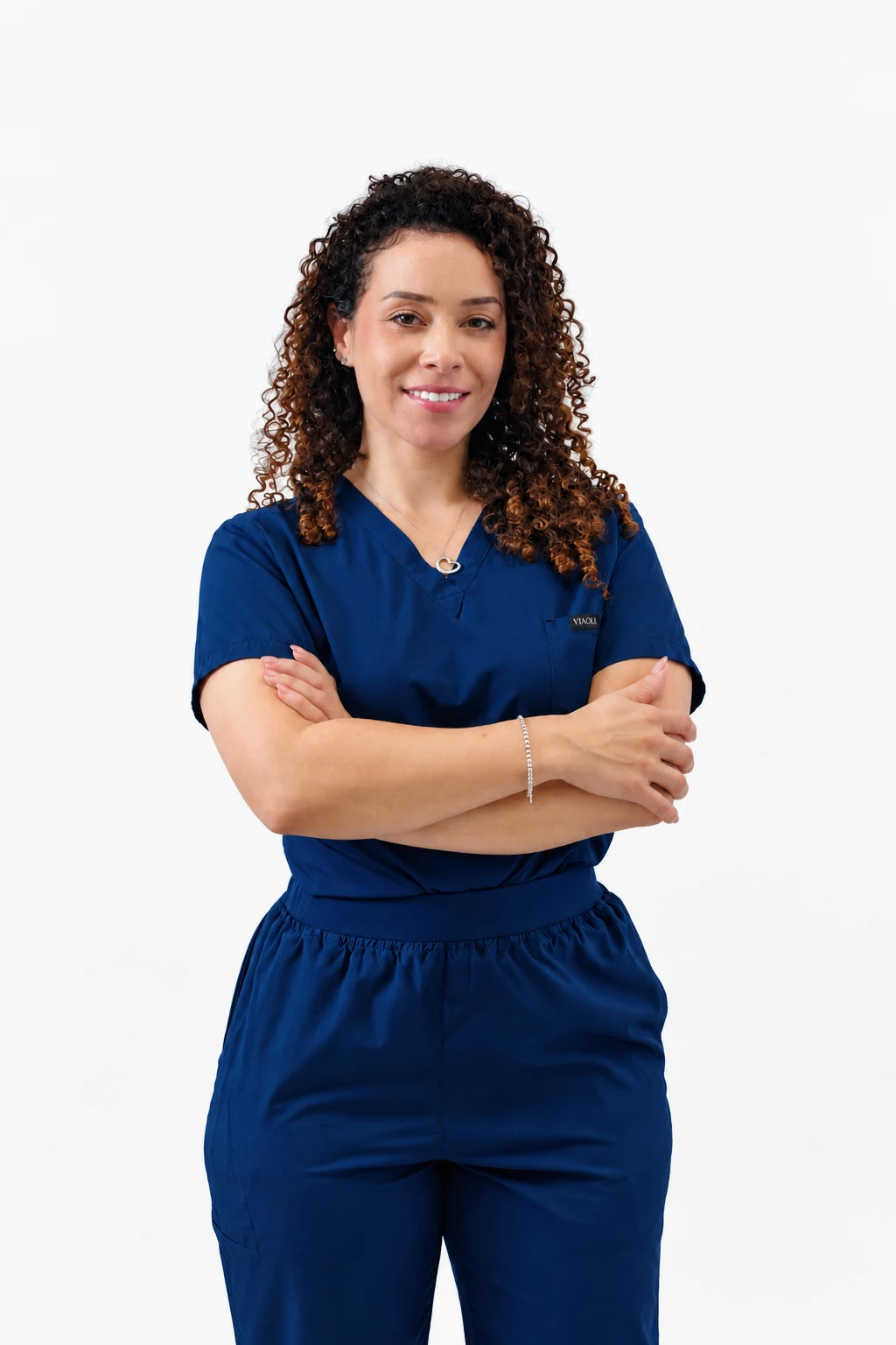 CYNTAR Advanced Dentistry team member in navy clinical uniform